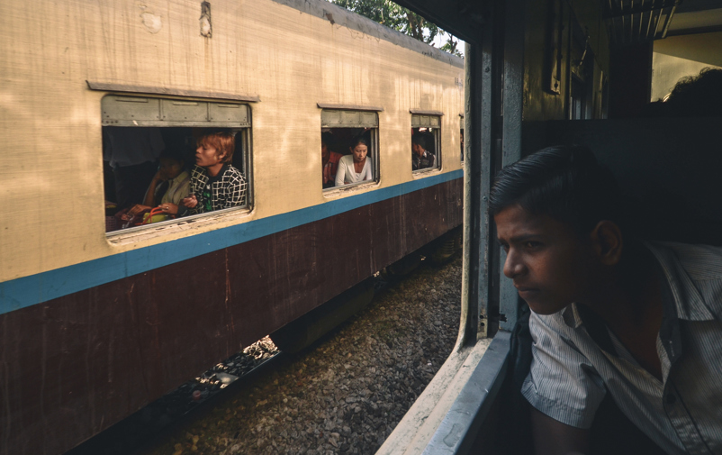 Passengers on a train in Myanmar.