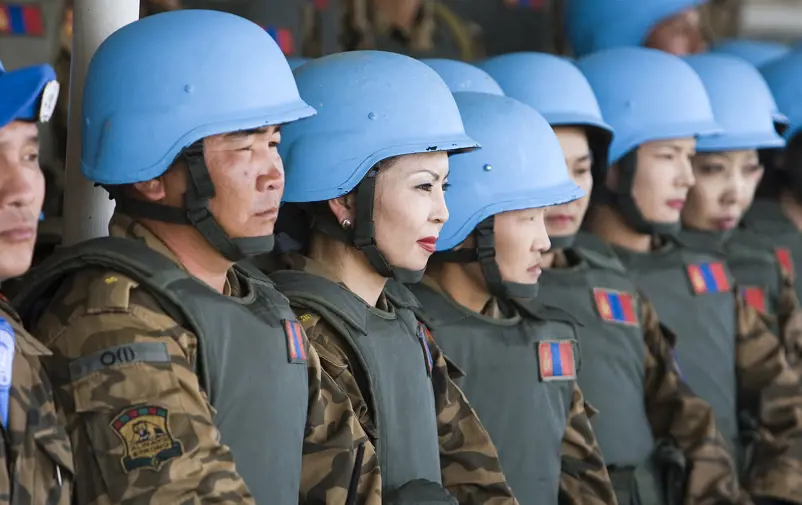 UN peacekeepers in blue helmets.