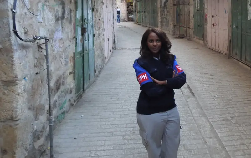 Idil Jamac patrolling the streets of Hebron.